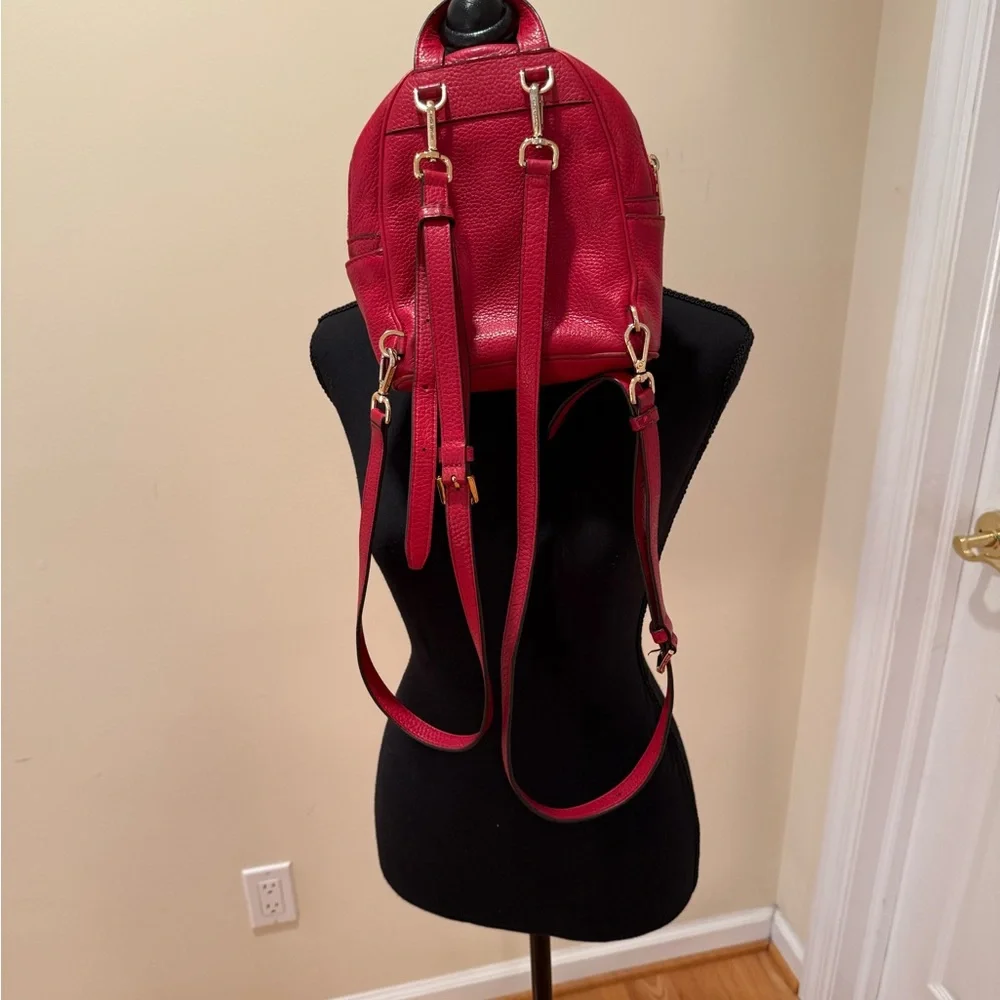 Michael Kors Abbey XS Studded Red Backpack with Gold Studs
Size 7 by 8 by 3 - Picture 5 of 16